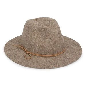 Slender suede self-tie wraparound the trim of this luxurious wool hat. Tab color